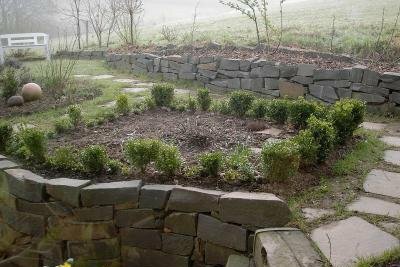 Enhance your garden path visually with natural stone slabs.