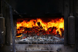 A wood stove provides pleasant warmth and saves heating costs.