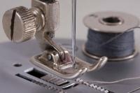 Sewing machine: the bobbin thread makes loops