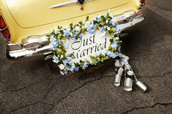 Cans on the car are a typical wedding custom.