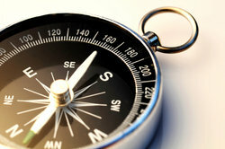 A compass is used to determine the exact direction.