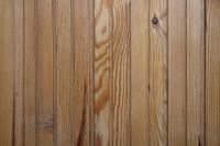Install a wooden panel on the wall