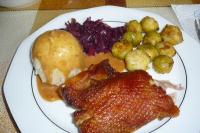 Duck breast with dumplings and red cabbage